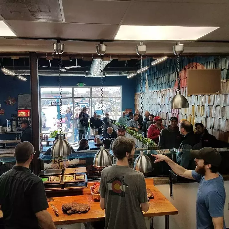Image: Customers line up on the first day Wayne's opened after an expansion.
