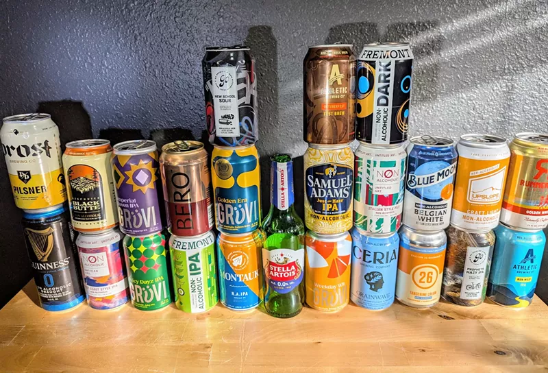 Image: cans of N/A beer lined up on a counter