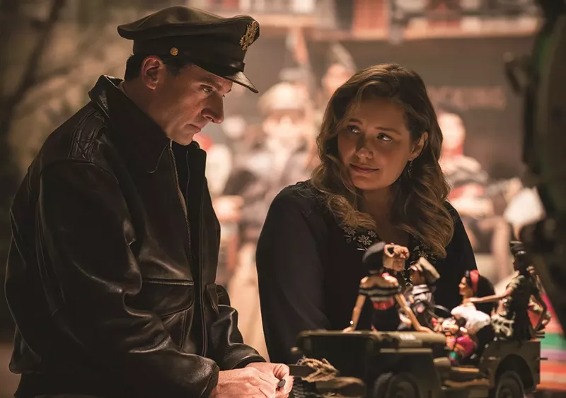 Image: In Robert Zemeckis’s Welcome to Marwen, Steve Carell (left) plays Mark Hogancamp as more of a Gumpian eccentric than an imaginative dude working his way through a tragedy while meeting real-life women such as Roberta (played by Merritt Wever).