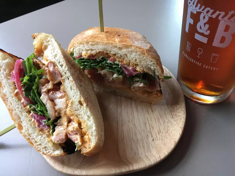 Image: The rotisserie chicken sandwich from the Rotary. Avanti's bar recommends Black Shirt Brewing's red kolsch.