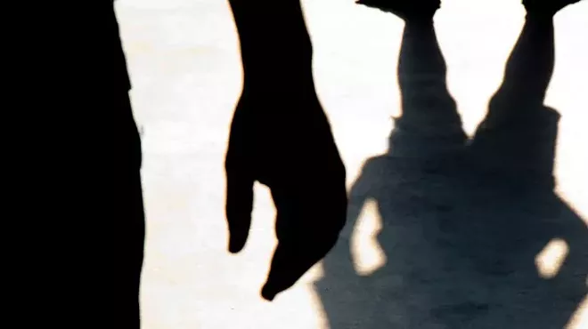 menacing shadow over kid