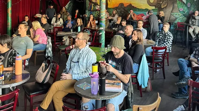 Crowd of people inside Mercury cafe in Denver