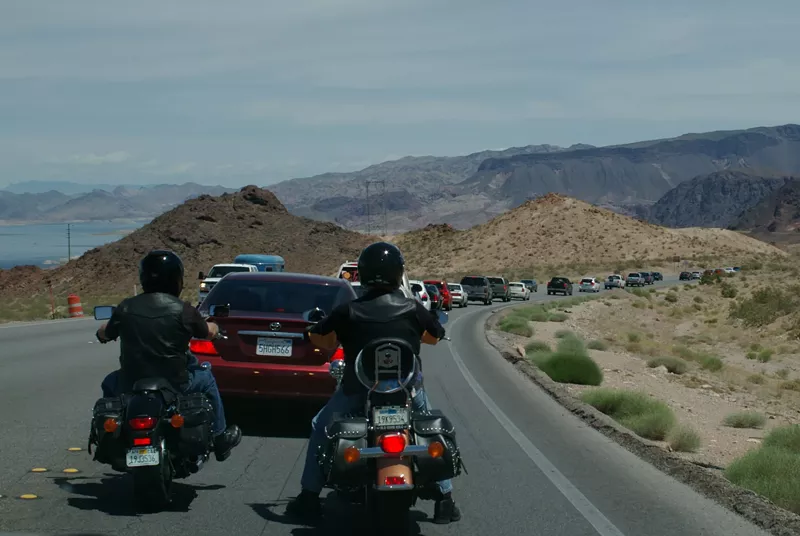 Image: Motorcycles stopped in traffic