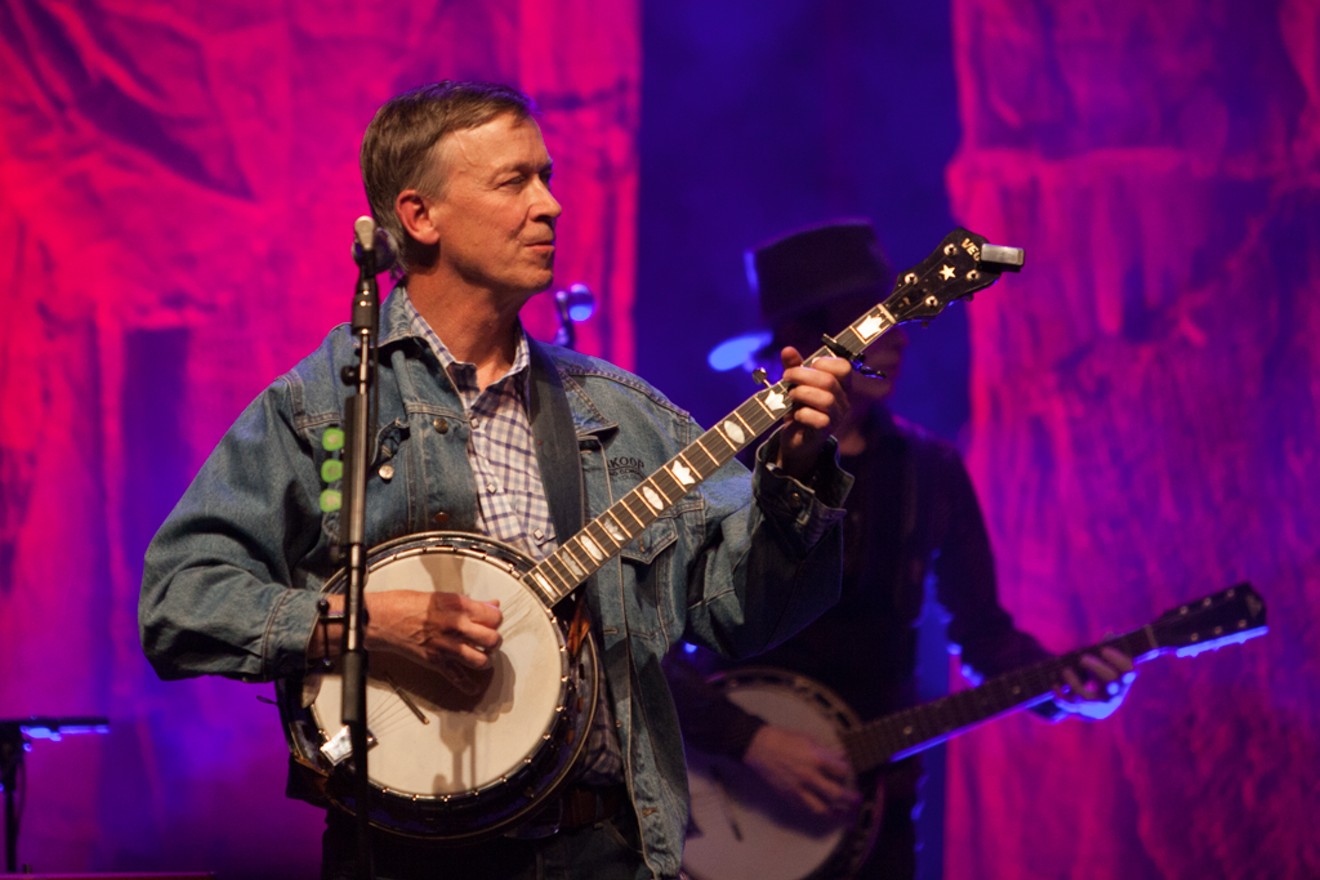 John Hickenlooper on stage with Old Crow Medicine Show.