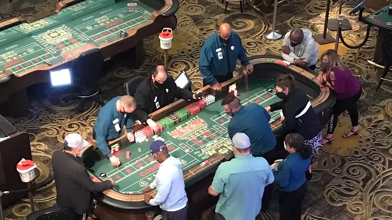 Image: Social distancing wasn't very distant at Ameristar Black Hawk's gaming tables.