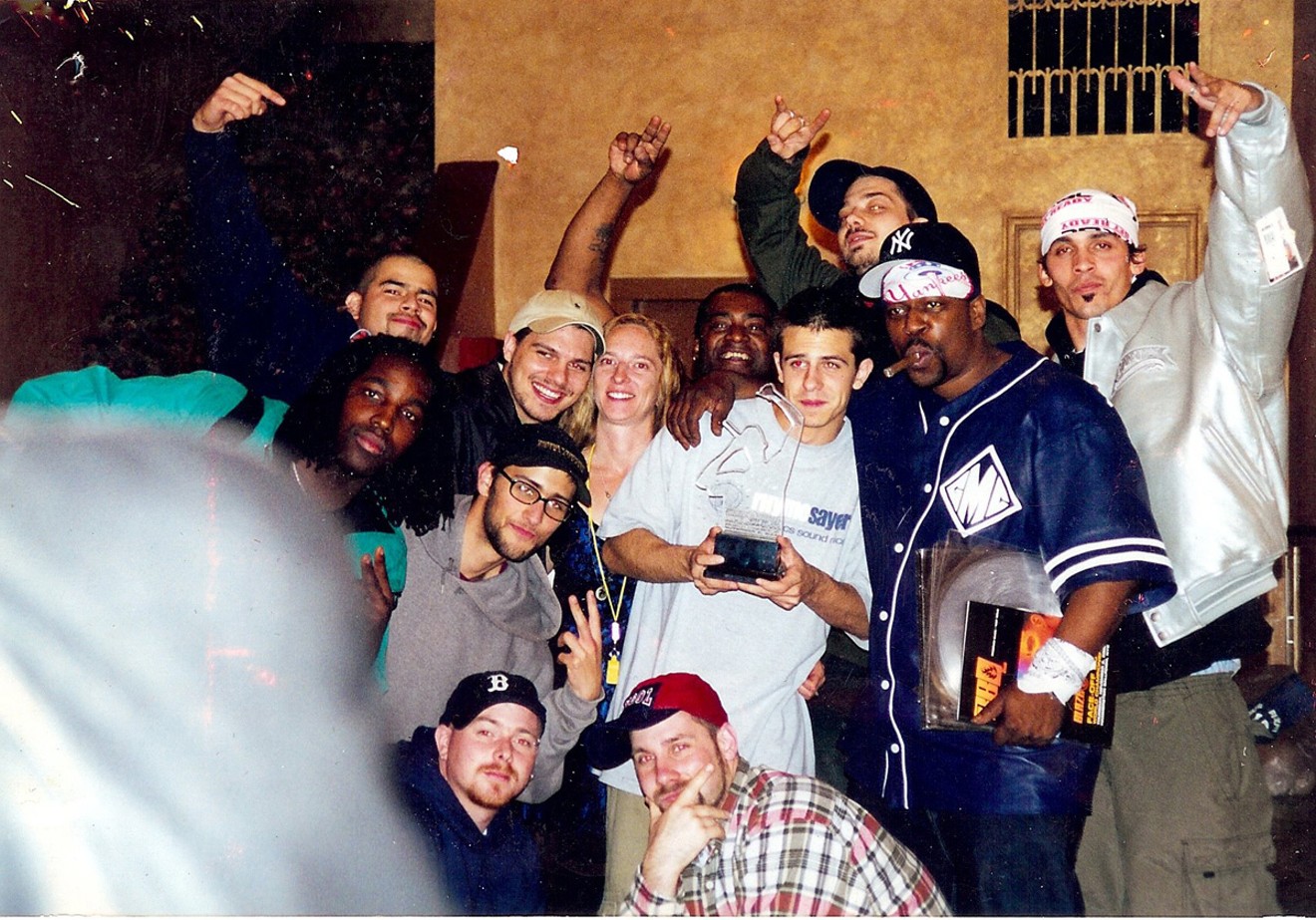 Michael "Eyedea" Larson (middle, white shirt) with some of the Rhymesayers crew.