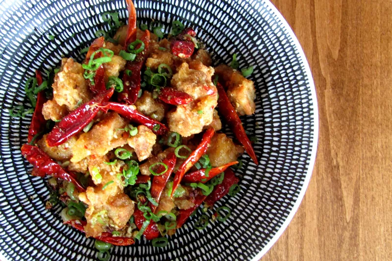 Image: Chong Qing chicken with red chiles and Sichuan peppercorns.
