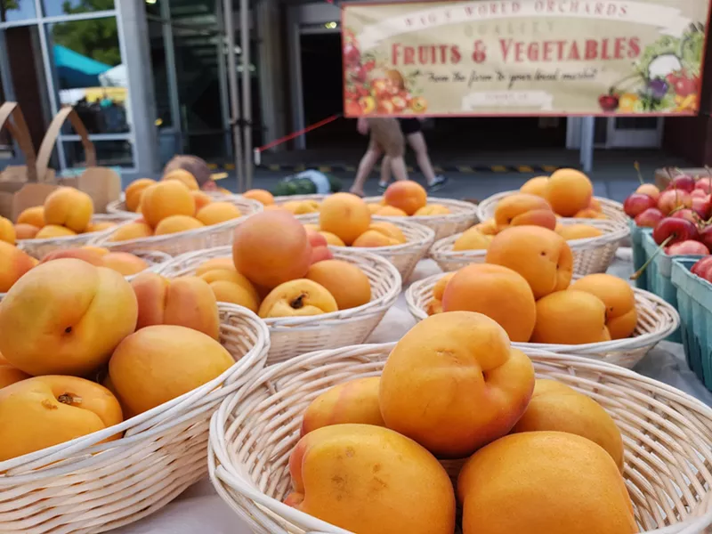 Image: The season for apricots is short, but at the South Pearl Street Farmers' Market, shoppers can find them at Wag's World Orchards.