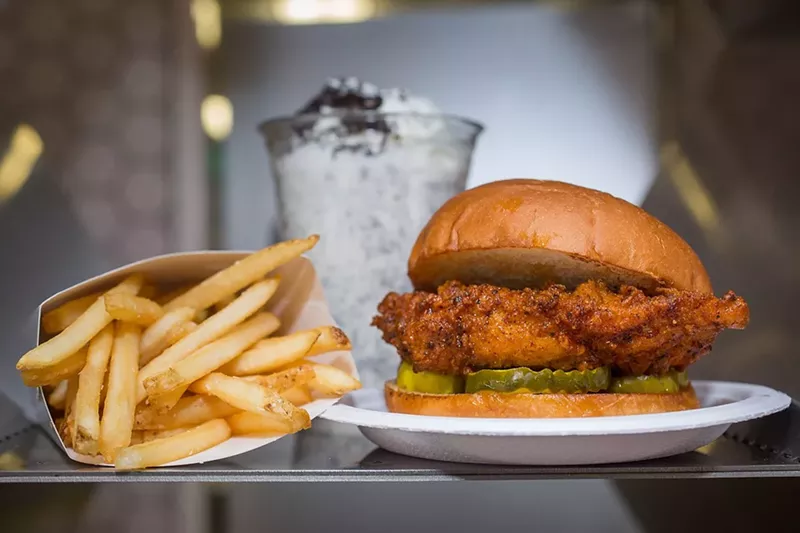 Image: a fried chicken sandwich and fries