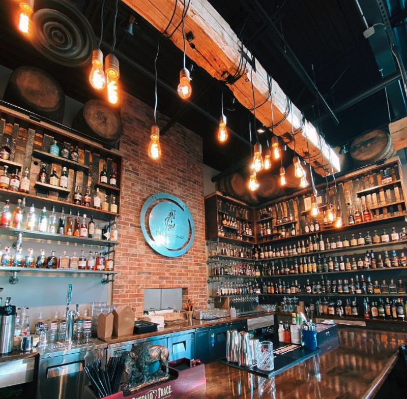 Image: inside of woody bar with liquor