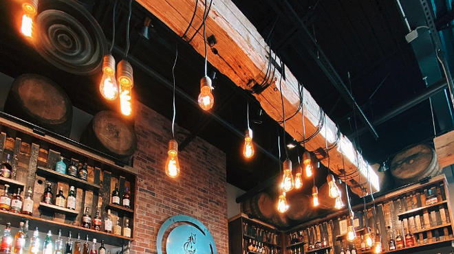 inside of woody bar with liquor