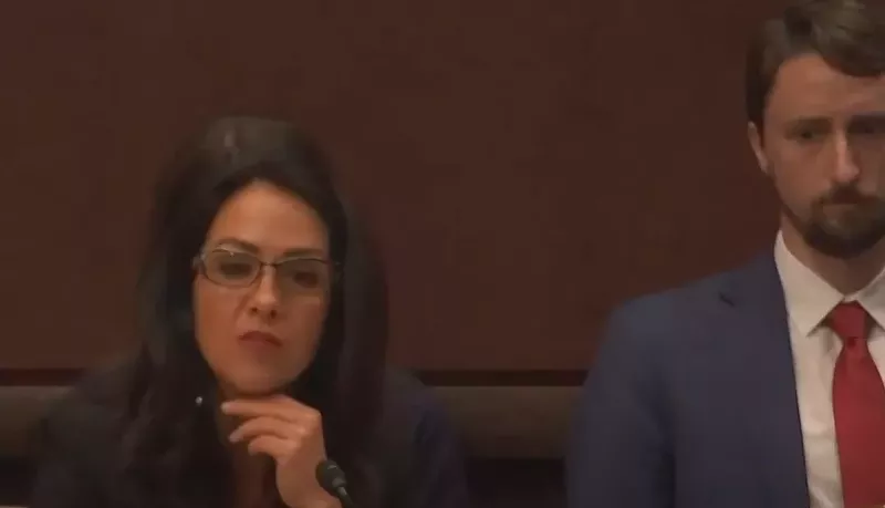 Image: Representative Boebert, slowly realizing that she's in the middle of looking dumb.