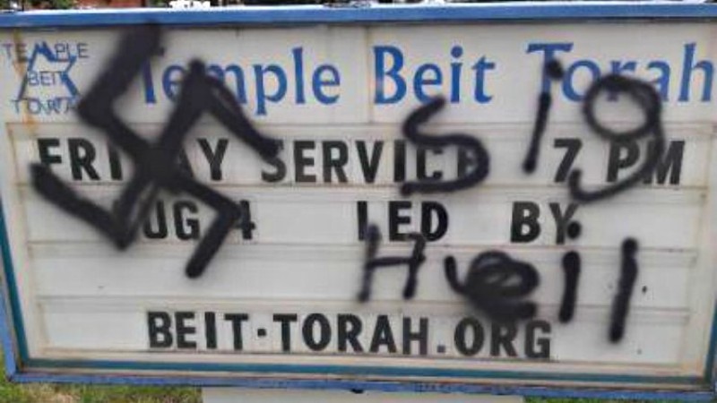 Vandalism on the sign of Temple Beit Torah in Colorado Springs circa August 2017.