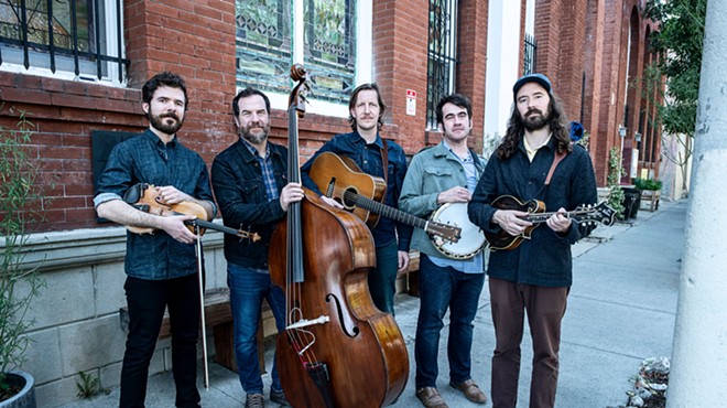 a bluegrass band poses for a picture