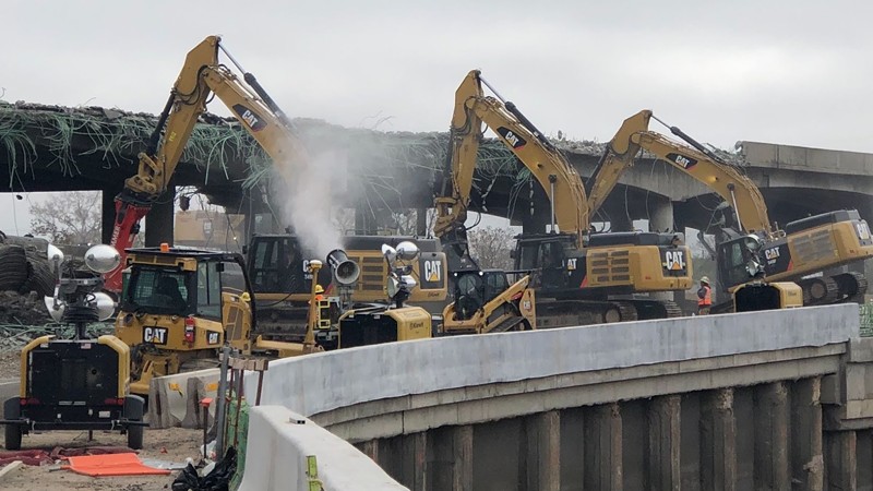 This photo from May 22 shows misting cannons being used to wet dust during the demolition of the old Interstate 70 viaduct.