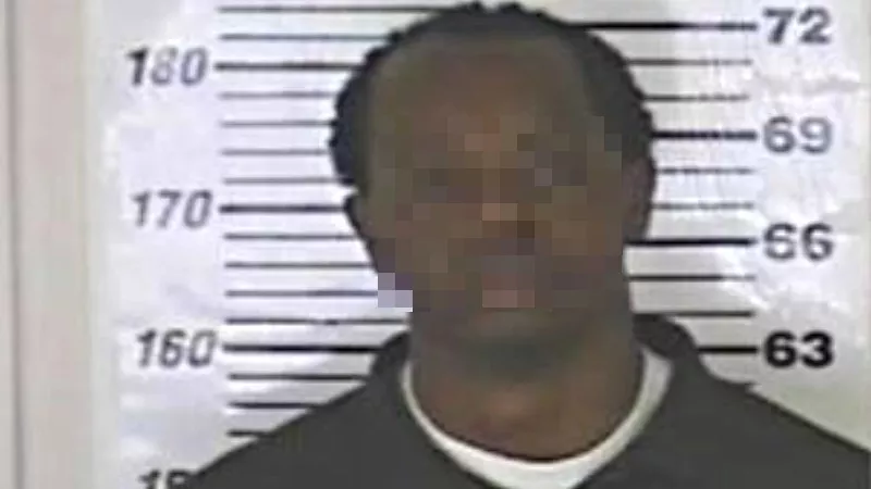 Image: A pixelated version of Dreion Martise Dearing's Colorado Department of Corrections mug shot.