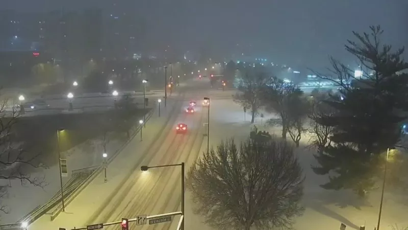 Image: A look at Denver streets last night, as the weather system currently lingering over the city was just getting started.