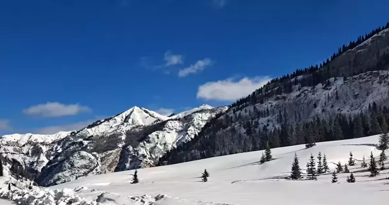 Image: ski slop under blue sky