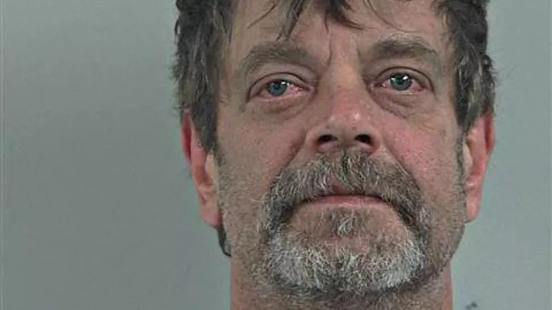 Image: Mark Redwine's booking photo.