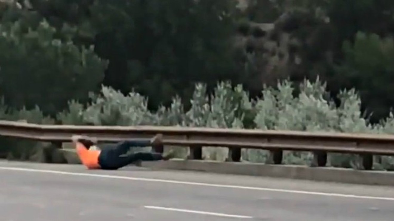 Rifle's Allan George falling to the ground after being shot in the back, as seen in a video on view below.