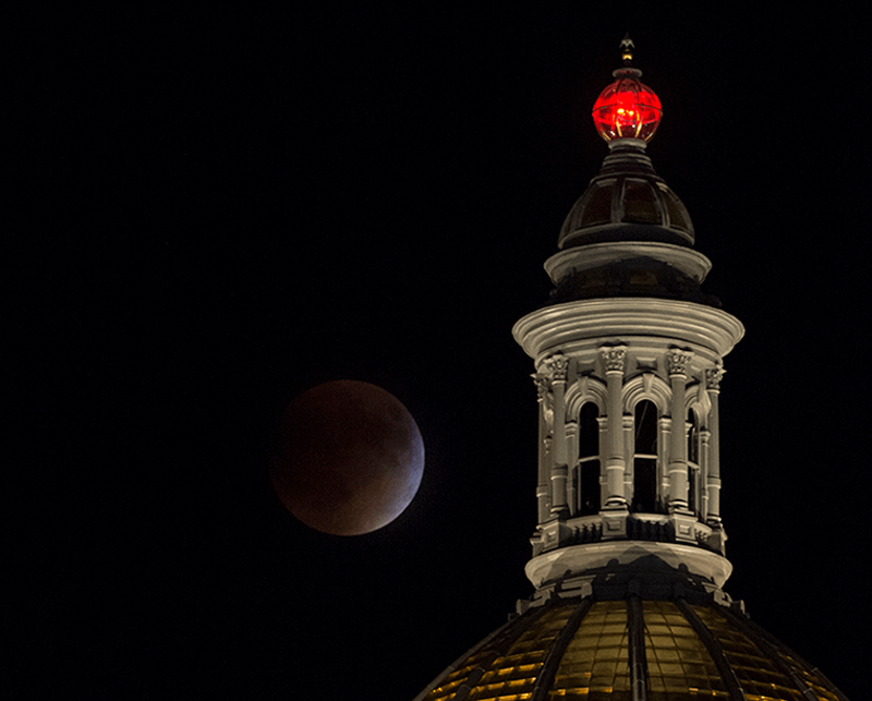 Image: A super moon sighting by the Colorado State Capitol in 2015.