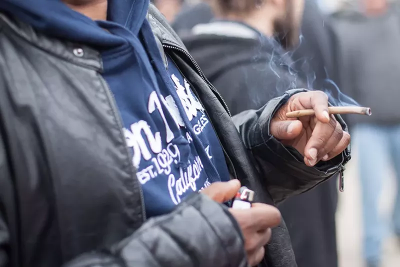 Image: Smoking weed in public on April 20 is still illegal, but that doesn't stop thousands from doing it.