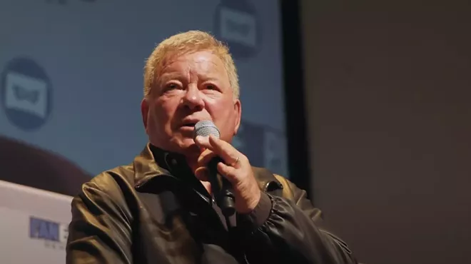 A man with a microphone