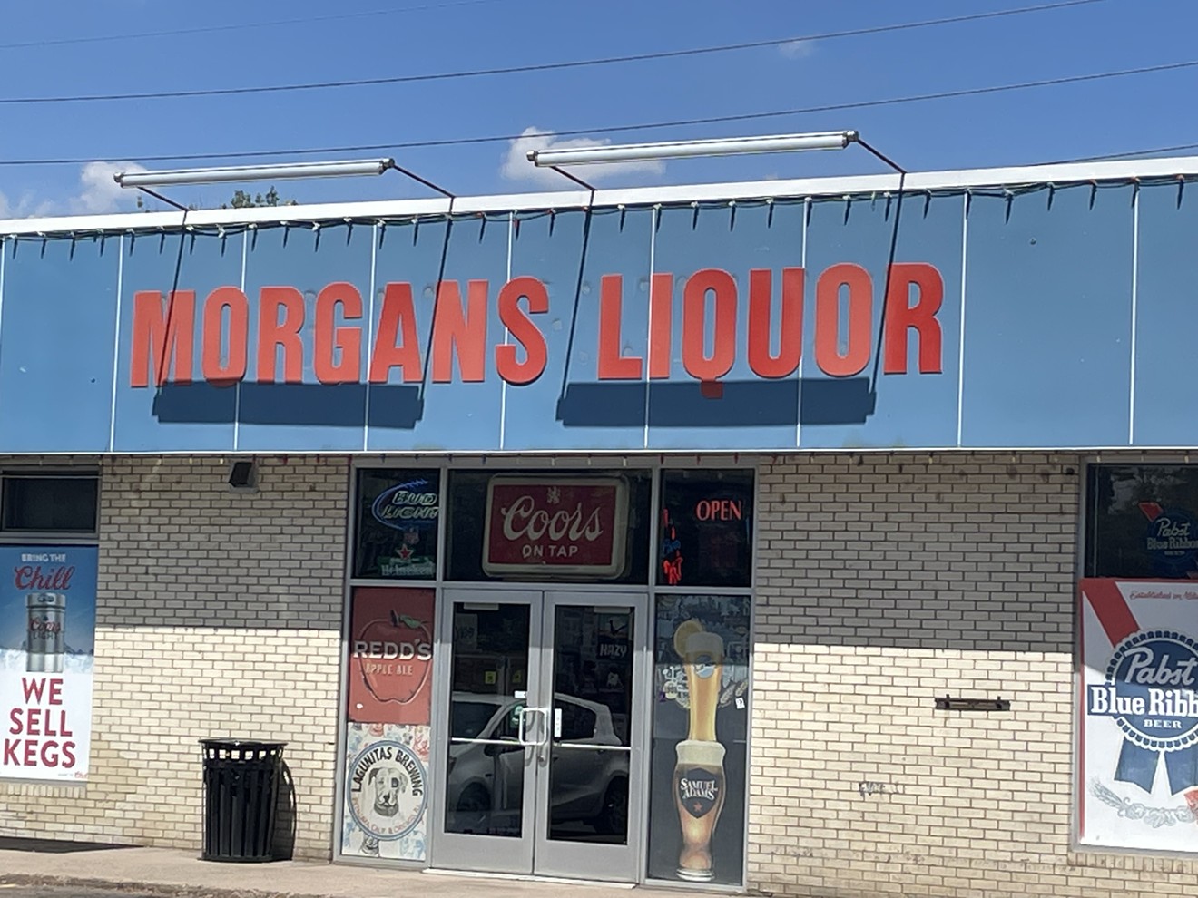 Morgan's Liquor is located in the same parking lot as a Safeway.
