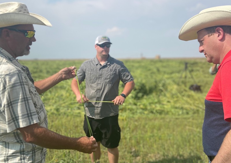 Governor Jared Polis (right) tours Wright-Oaks Farms, the home to a hemp pilot project between Patagonia and the State of Colorado.