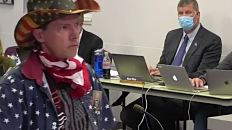 Sean Benson donned patriotic garb during the November 9 meeting of the Douglas County School Board.