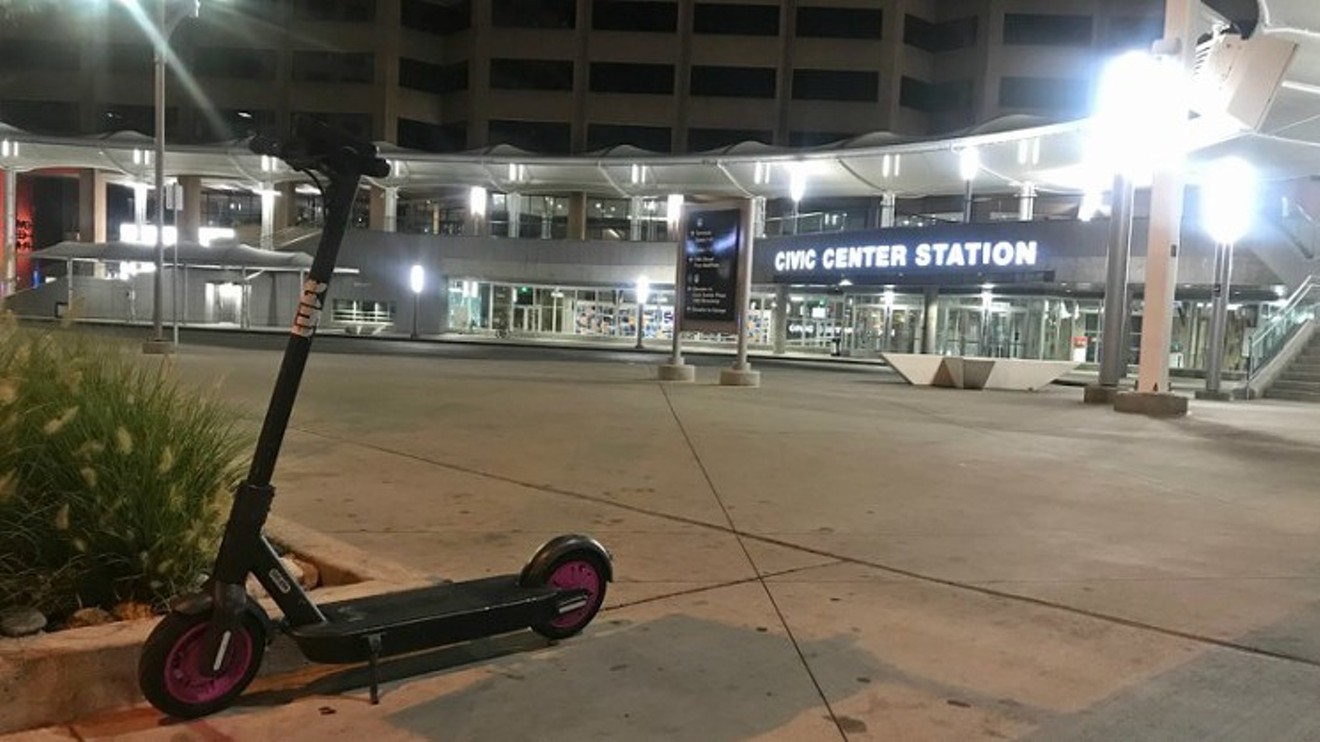 Electric scooters like the one seen here have become ubiquitous in many Denver neighborhoods.