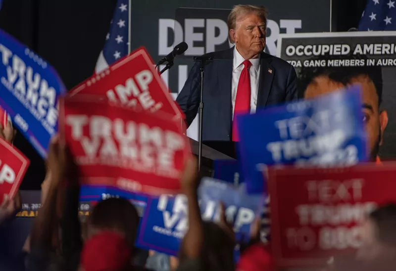 Image: Trump on stage at rally