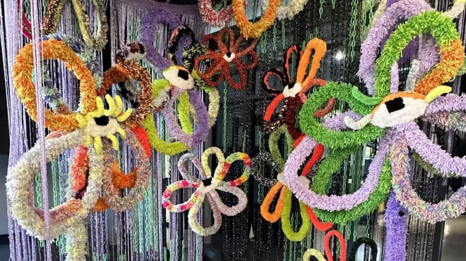 Colorful yarn flower sculptures