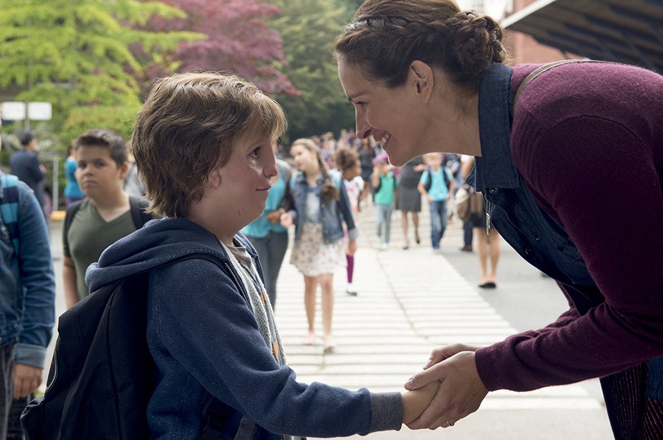 In Wonder, Jacob Tremblay (left) plays Auggie Pullman, a ten-year-old who has had 27 surgeries on his face and deals with the outside world after his mother (Julia Roberts) sends him to middle school.