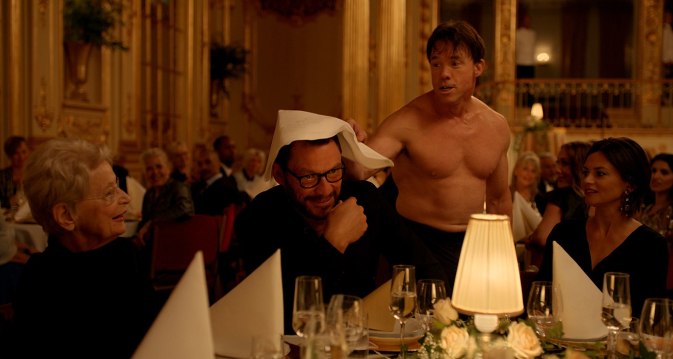 In The Square, a gala dinner at a contemporary art museum in Sweden is interrupted by a man, pretending to be an ape, who is played by Terry Notary (second from right), the American stuntman and motion capture coordinator.