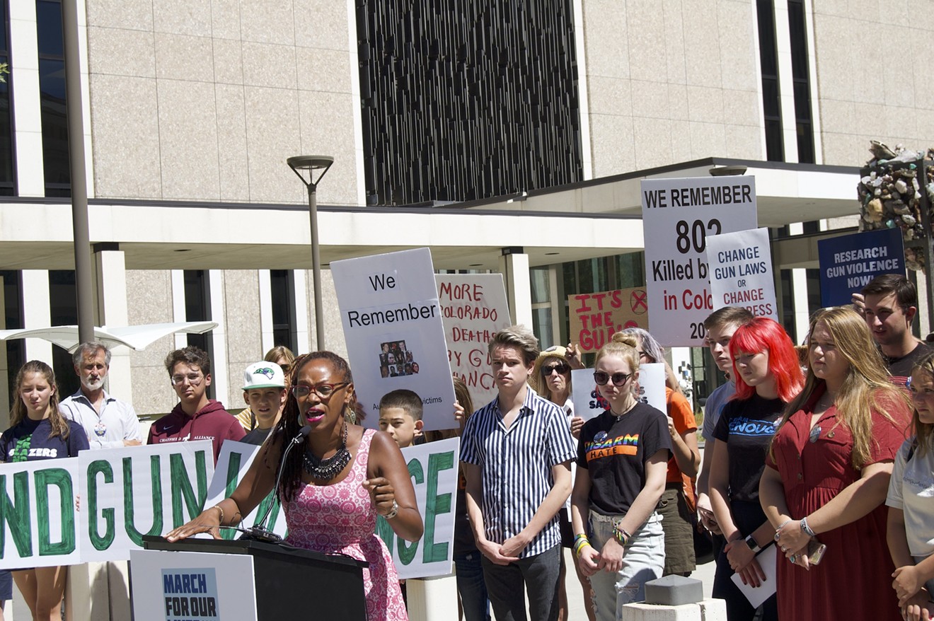 Maisha Fields speaks at a press conference pressing Cory Gardner to support common-sense gun control on August 9.