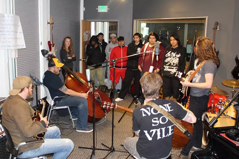 Image: Billy Strings records with students at Youth on Record.
